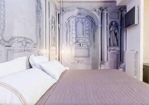 Studio | Egyptian cotton sheets, pillow-top beds, desk, iron/ironing board