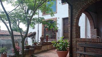 Casa, 4 quartos | Terraço/pátio