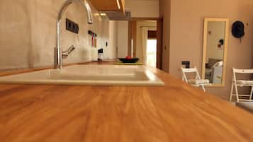 Fridge, stovetop, coffee/tea maker, electric kettle