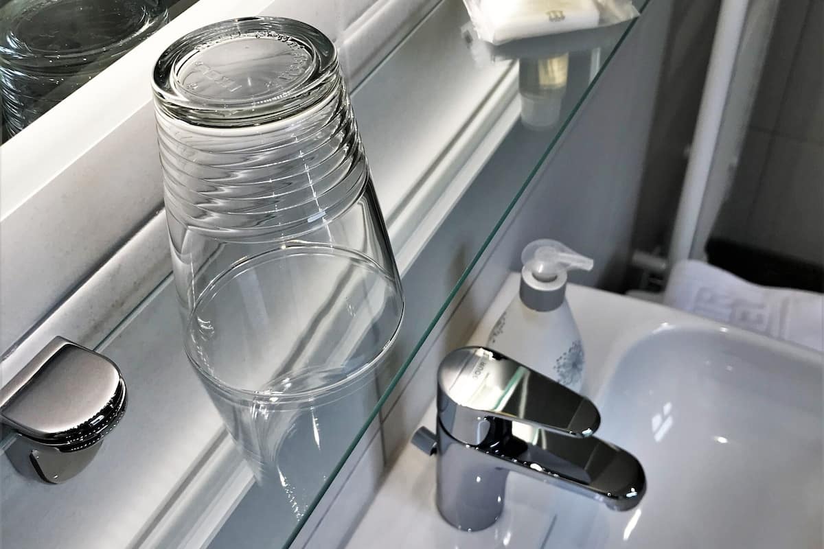 comfort single room (plus) | bathroom | shower, free toiletries, hair dryer, bathrobes