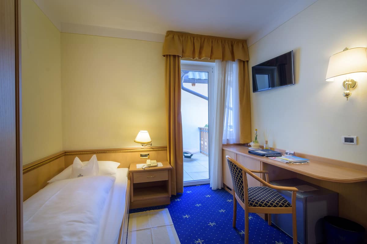 Chambre simple | Literie de qualité, minibar, coffre-fort, bureau
