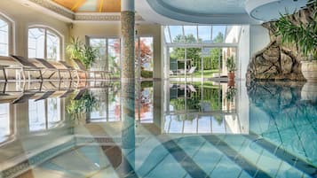 Indoor pool, outdoor pool, pool umbrellas, pool loungers