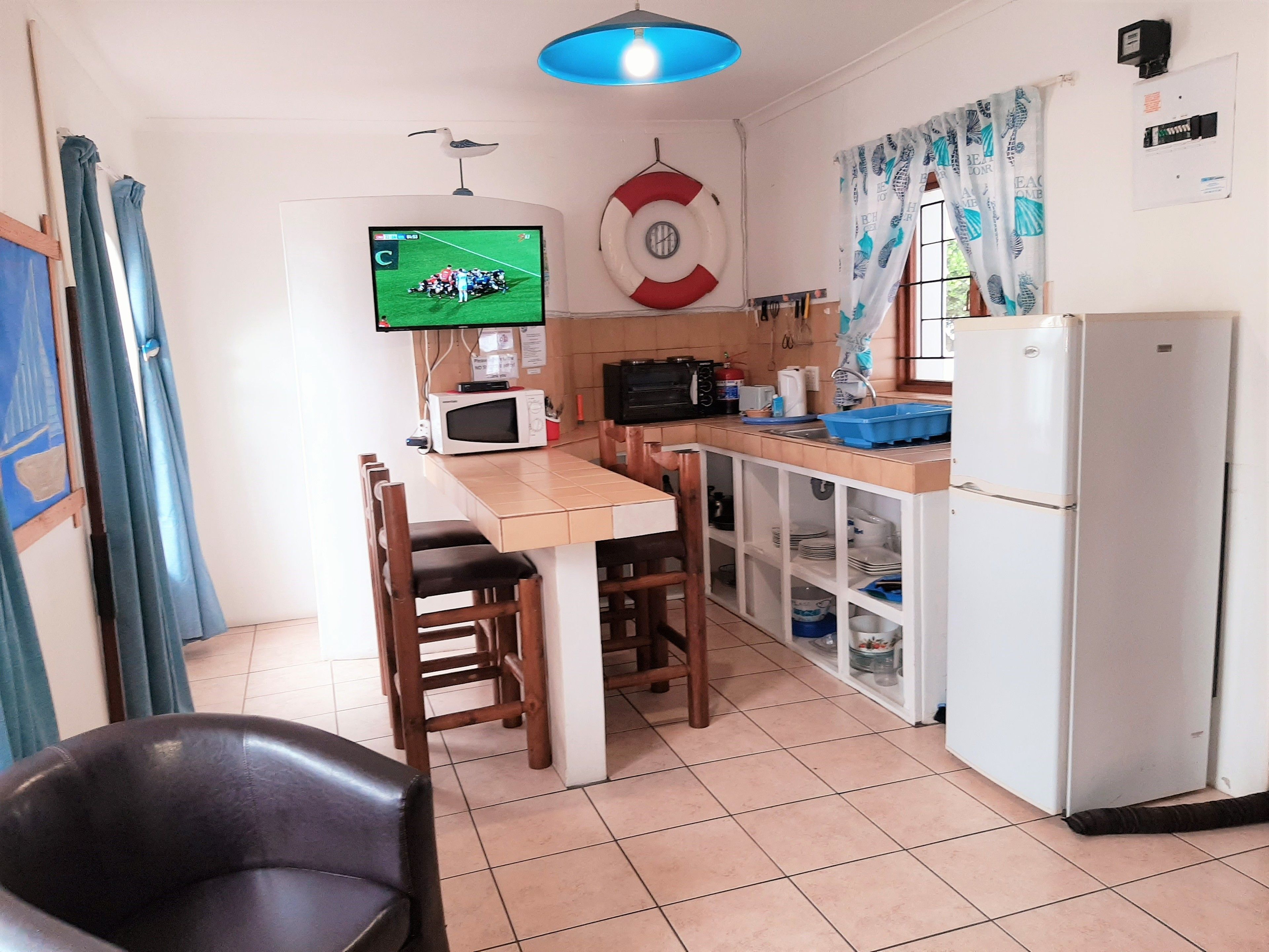 Suíte família | Cozinha privada | Geladeira, micro-ondas, cooktop, chaleira elétrica