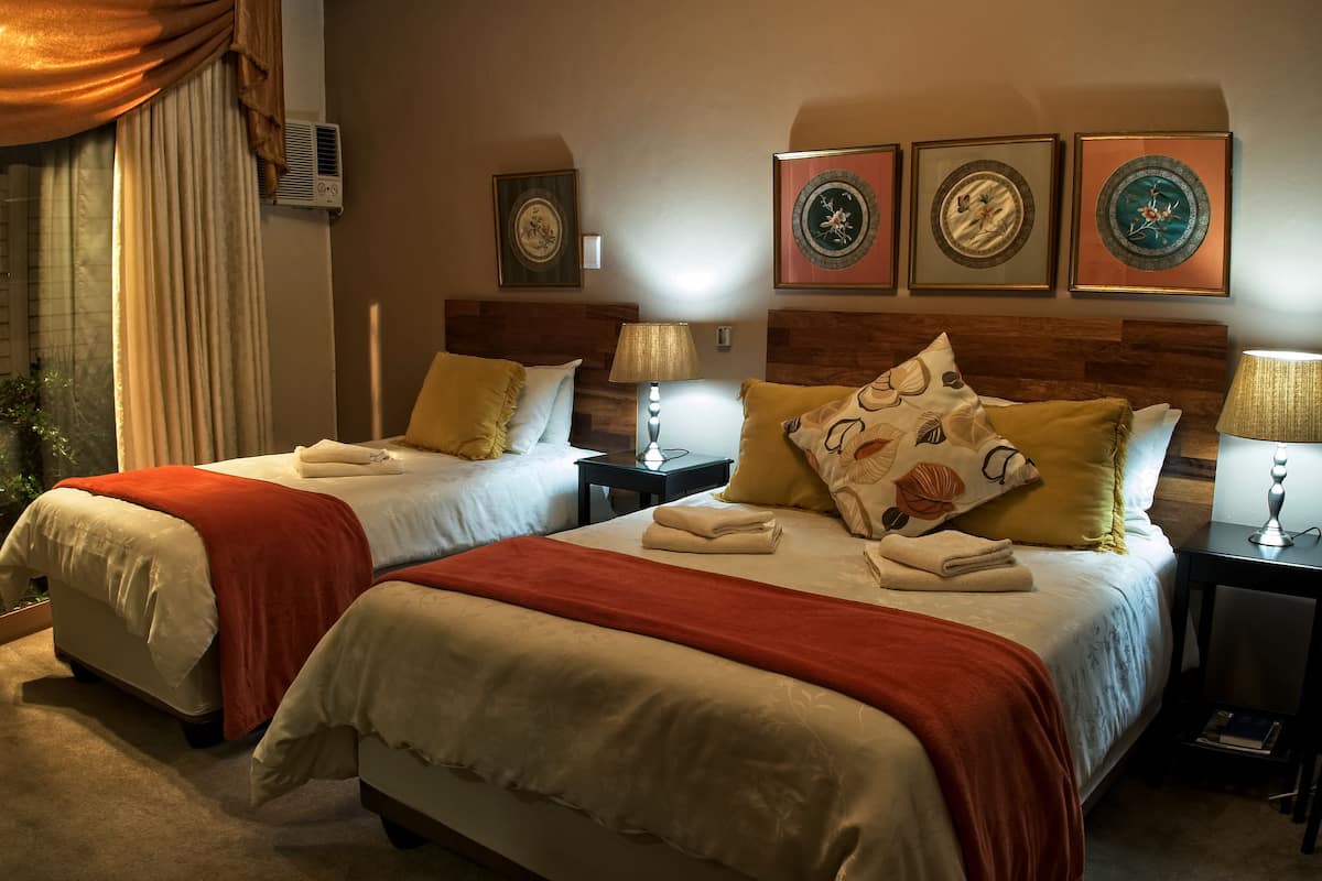 Sunflower Family Room | 1 dormitorio, ropa de cama de alta calidad, colchones Select Comfort