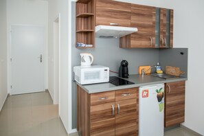 Apartamento superior (River View or Garden View) | Ferros/tábuas de passar roupa, Wi-Fi de cortesia