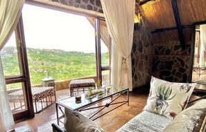 Suite de luna de miel, 1 cama de matrimonio grande, vistas a la montaña | 1 dormitorio, sábanas de algodón egipcio, ropa de cama de alta calidad