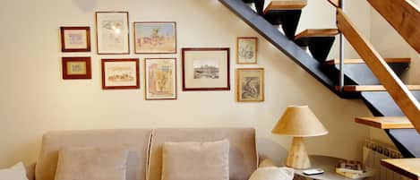 Design Loft | Living area | 40-inch Smart TV with digital channels, Netflix, pay movies