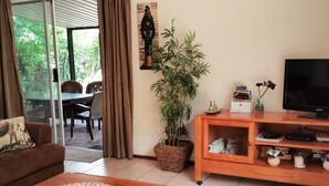 Family Cottage, 2 Bedrooms | Living room | TV, DVD player - Pine Tree Lodge (Midrand)