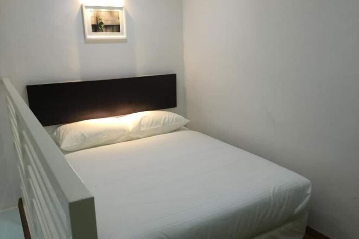 Premium bedding, desk, laptop workspace, iron/ironing board (on request)