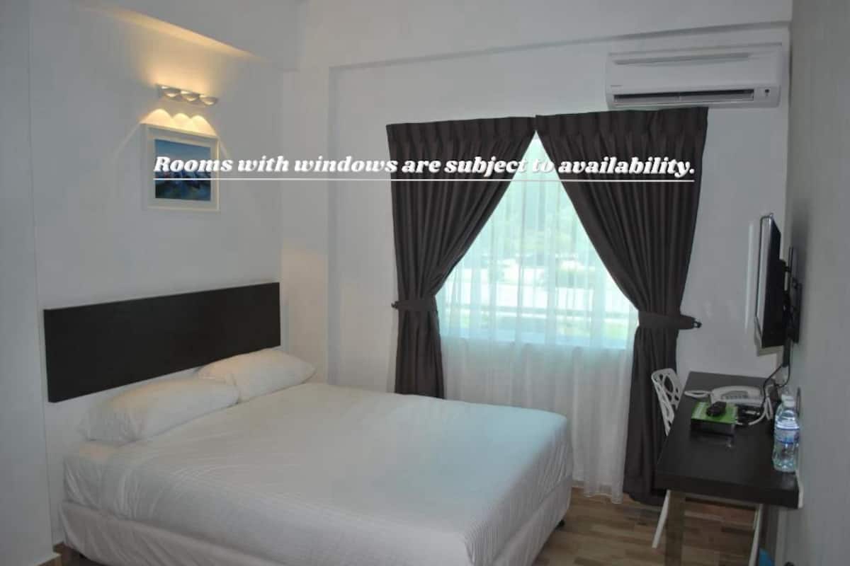 Premium bedding, desk, laptop workspace, iron/ironing board