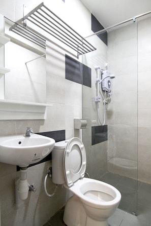 Shower, free toiletries, towels, soap