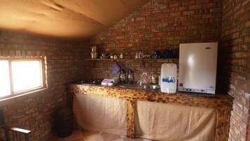 Fridge, high chair, cookware/dishes/utensils