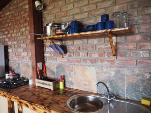 Dassie Rock House | Private kitchenette | Fridge, high chair, cookware/dishes/utensils