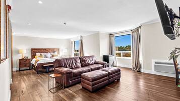 NH Comfort Spa Suite | Premium bedding, down comforters, memory foam beds, desk