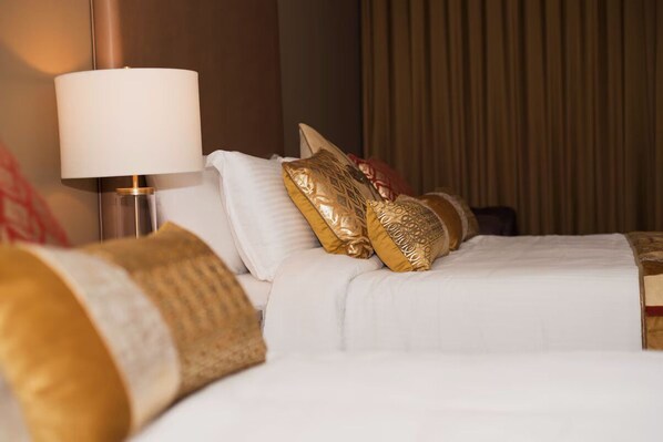 NH Garden Suite | Premium bedding, down comforters, memory foam beds, desk