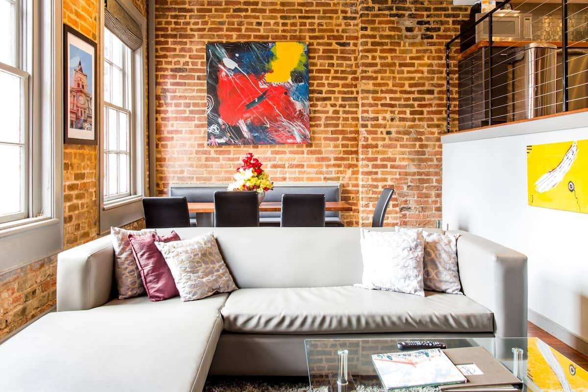 Luxury Suite, 4 Bedrooms, Balcony | Living area | Flat-screen TV