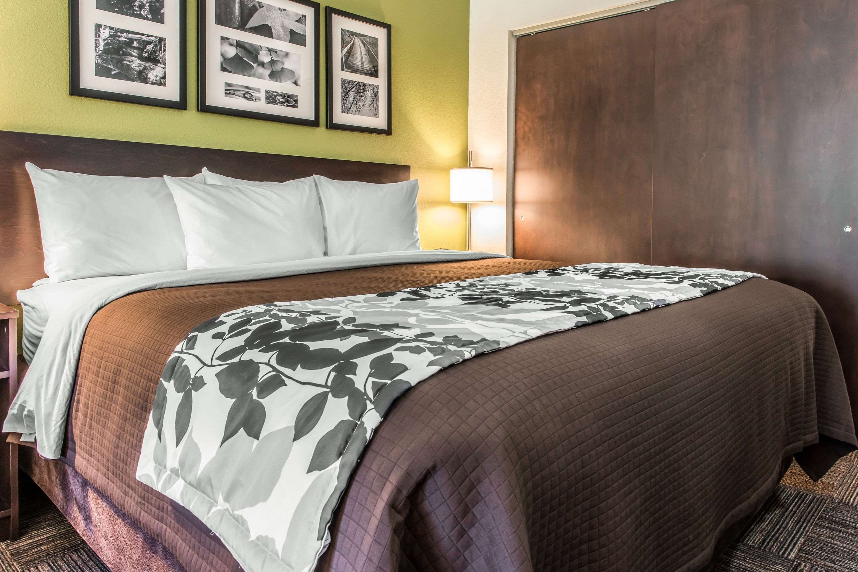 premium bedding, desk, laptop workspace, blackout curtains