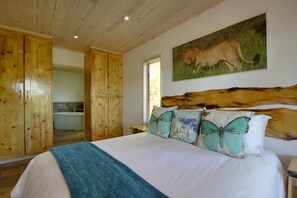 In-room safe, individually decorated, individually furnished, desk - Monzi Safari Lodge (Monzi SH)