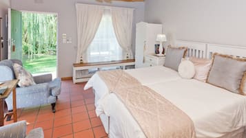 Chambre Confort avec lits jumeaux, 2 lits une place, non-fumeurs, vue jardin | Literie hypoallergénique, coffres-forts dans les chambres