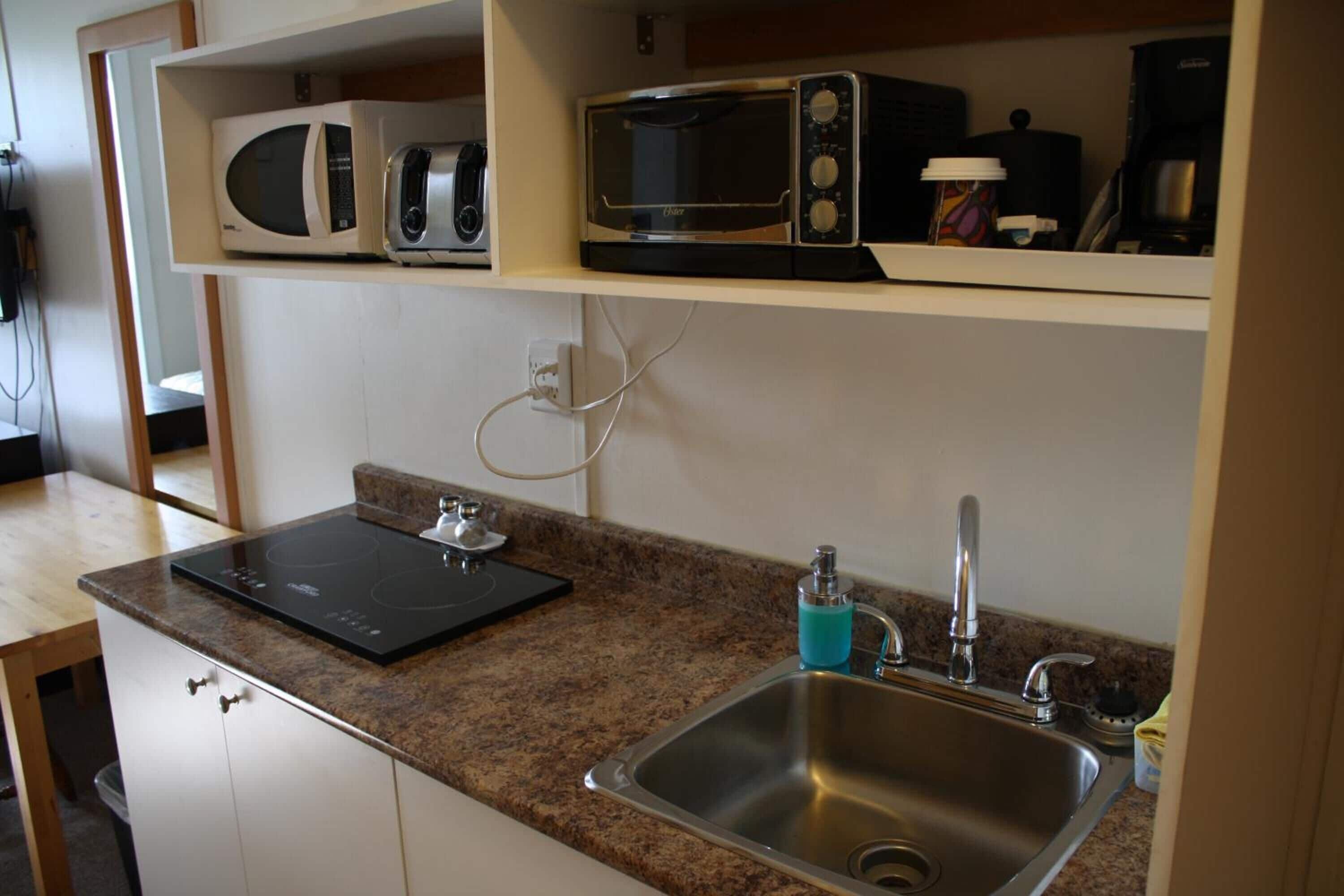 Fridge, microwave, coffee/tea maker, ice maker