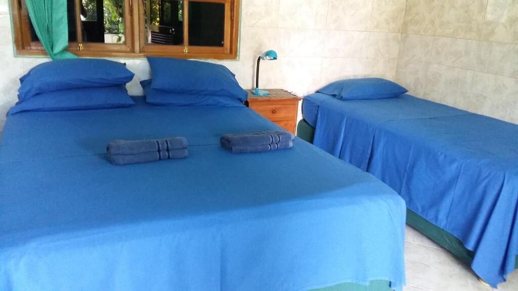 deluxe room | in-room safe, laptop workspace, bed sheets