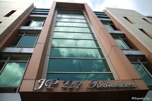 A building with a sign reading "JP 227 Residences". - JP 227 Residences (Bacolod)