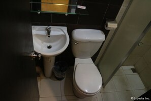 Habitación Deluxe | Baño | Ducha y toallas