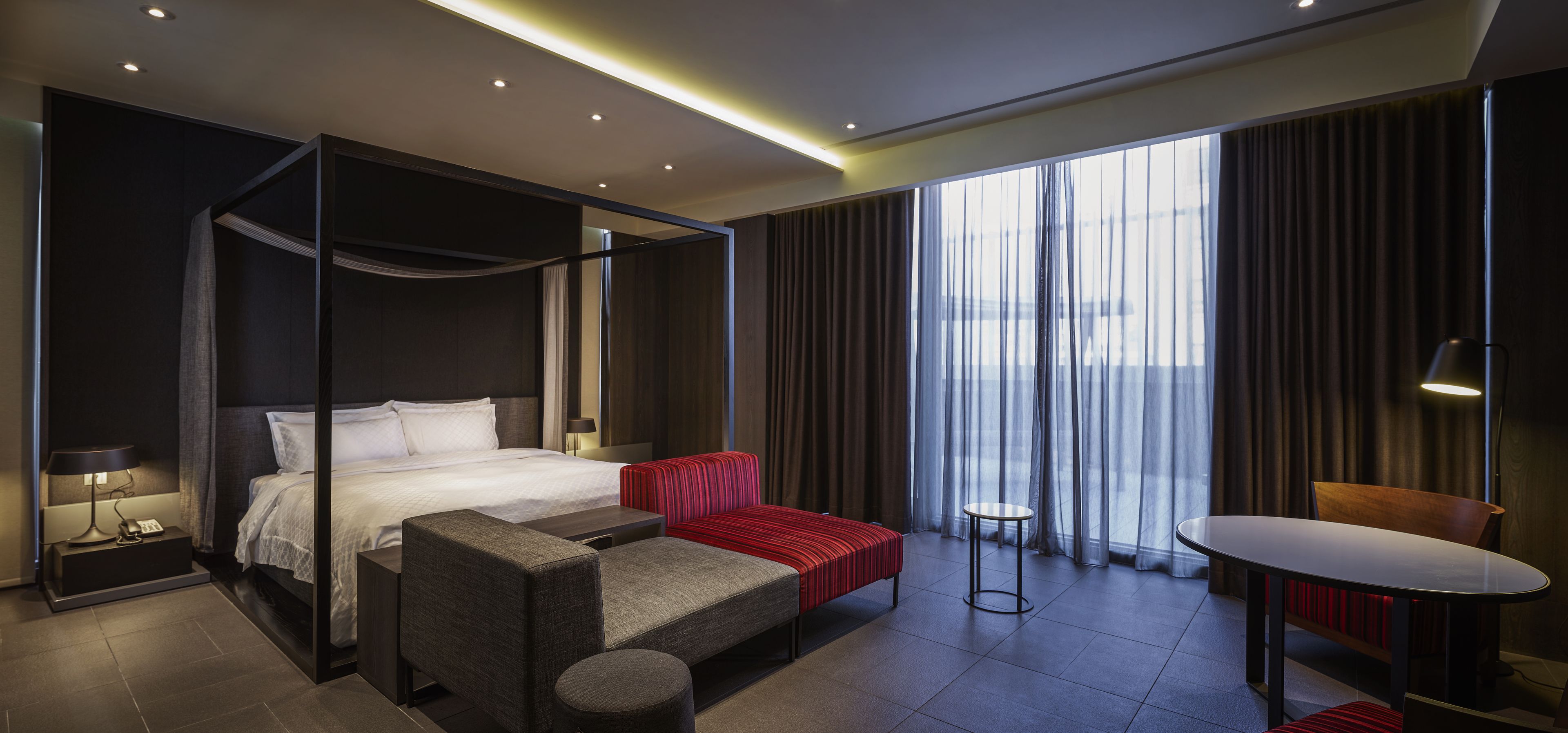 premium suite | premium bedding, down duvets, in-room safe, desk