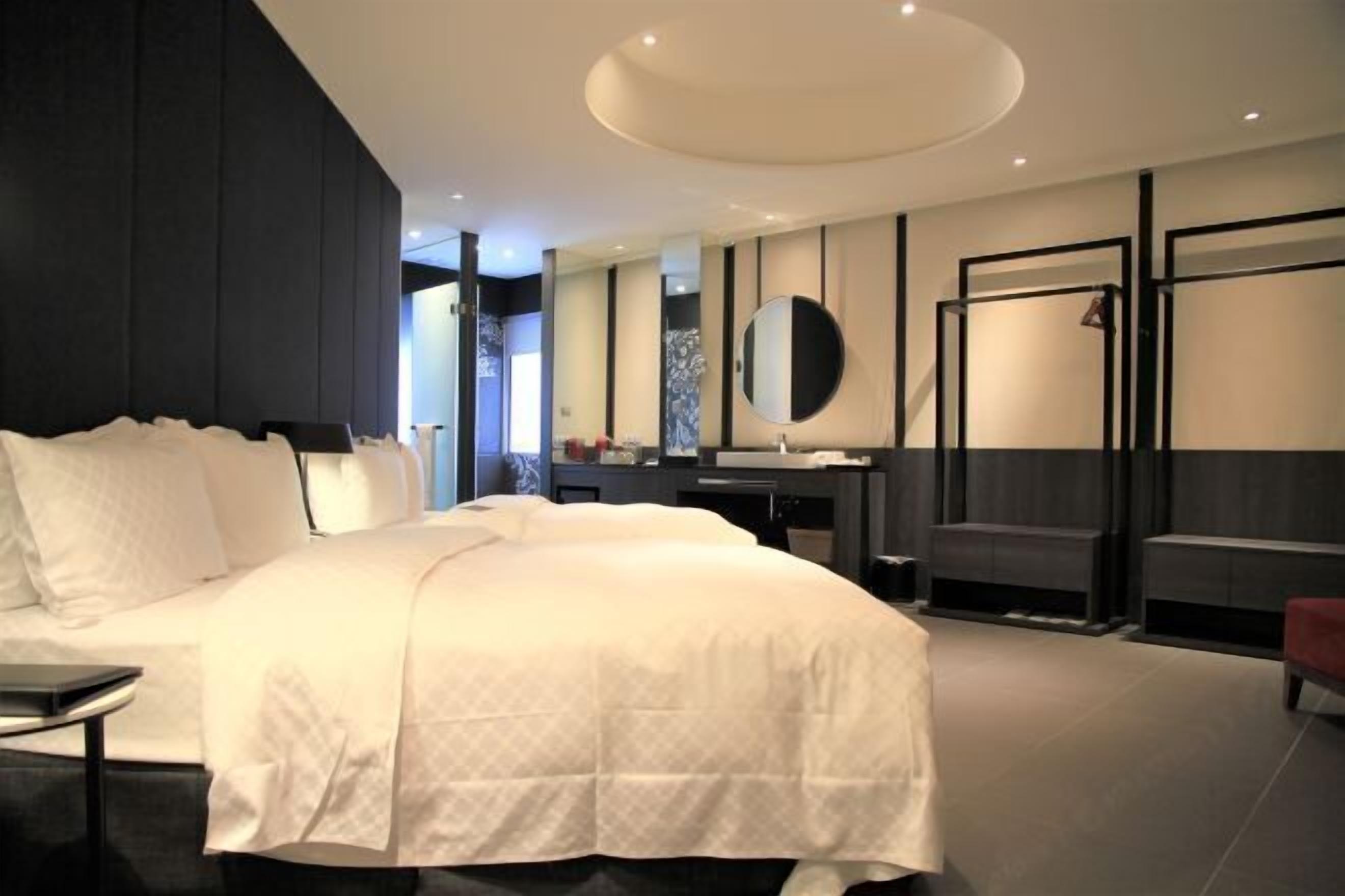 Premium bedding, down duvets, in-room safe, desk