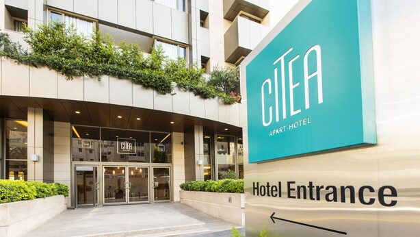 The entrance of a hotel with a sign indicating it is an apartment hotel. - Citea Apart-Hotel (Beirut)