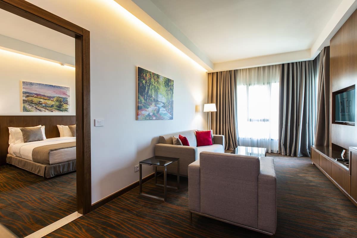Premium Suite, 1 Bedroom | In-room safe, desk, soundproofing, iron/ironing board (on request)