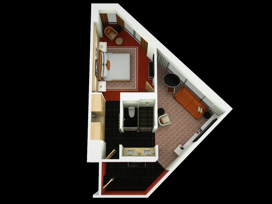 A 2D floor plan of a hotel room with a bed, a small sitting area, a kitchenette, and a bathroom.
