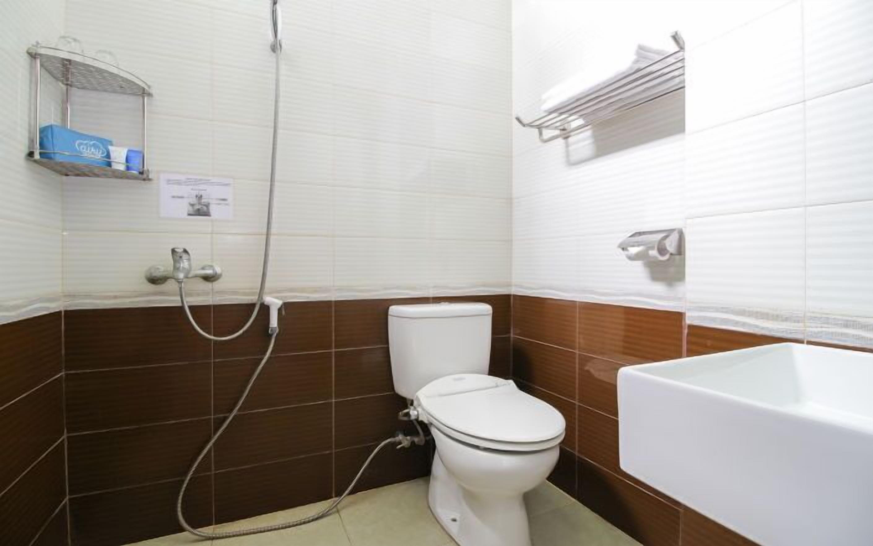 free toiletries, slippers, bidet, towels