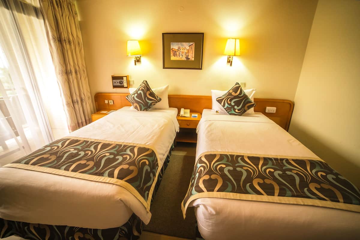 Standaard Twin kamer | Luxe beddengoed, een minibar, een kluis op de kamer, een bureau