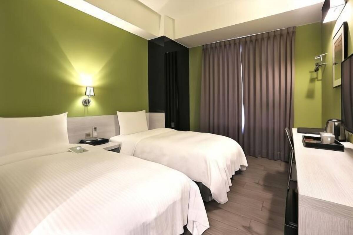 Premium bedding, down duvets, in-room safe, desk