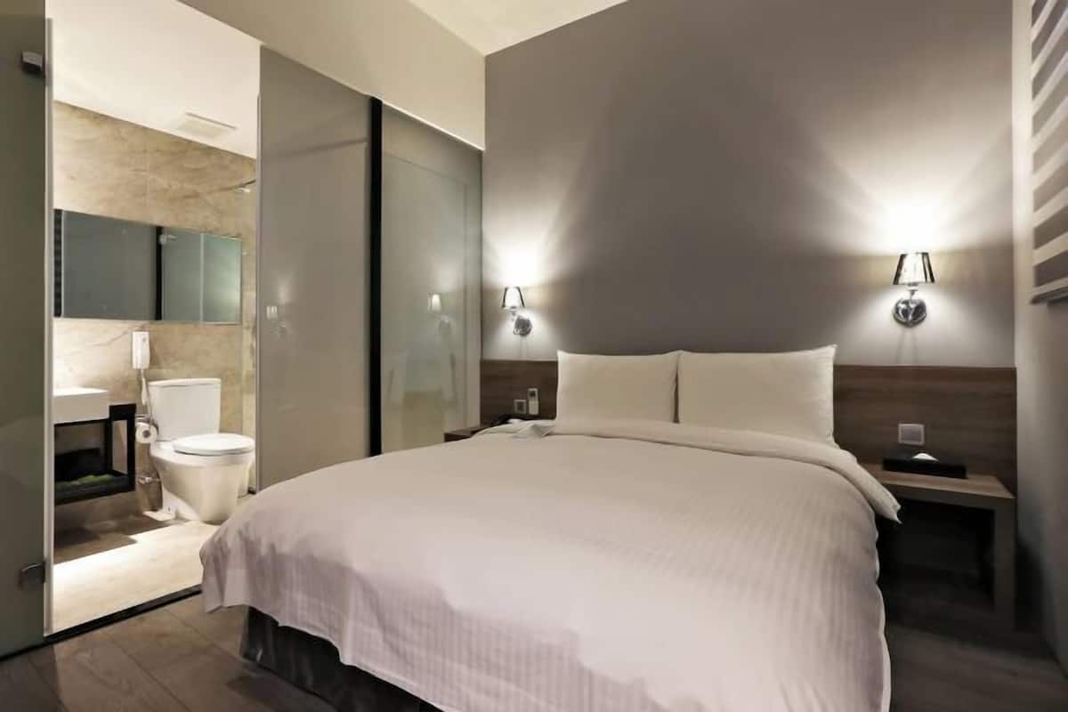 Premium bedding, down duvets, in-room safe, desk