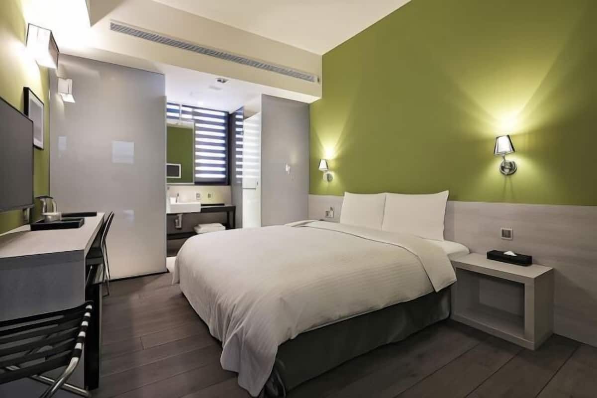 Premium bedding, down duvets, in-room safe, desk