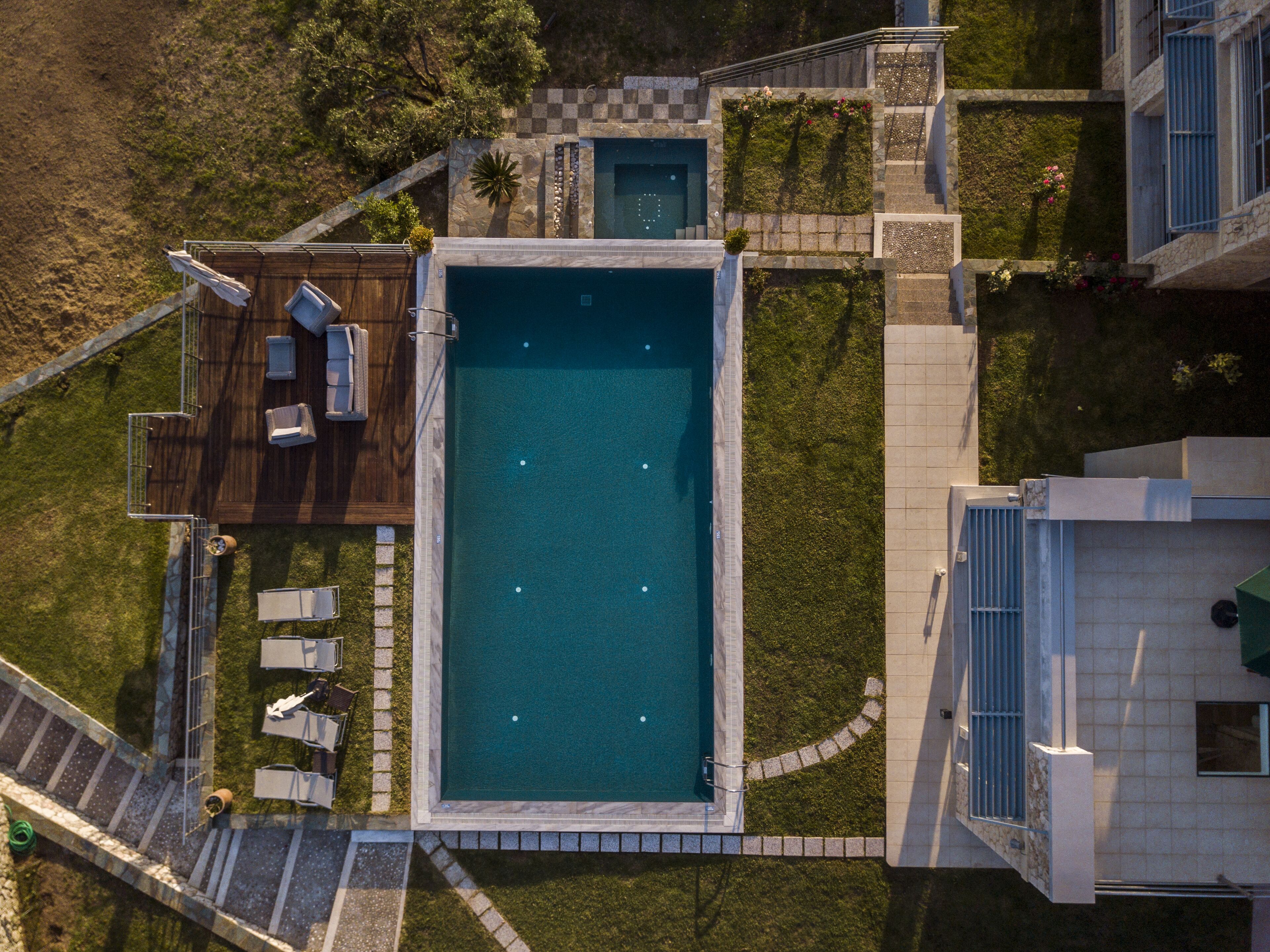 Seasonal outdoor pool, pool umbrellas, pool loungers