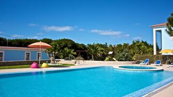 Outdoor pool, pool umbrellas, pool loungers