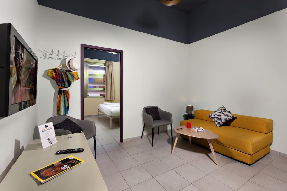 Junior Suite, 1 Bedroom | 1 bedroom, blackout drapes, soundproofing, free WiFi