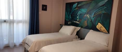 Premium bedding, in-room safe, individually decorated