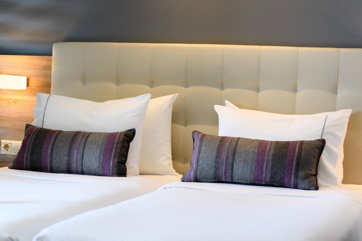 hypo-allergenic bedding, in-room safe, desk, blackout curtains