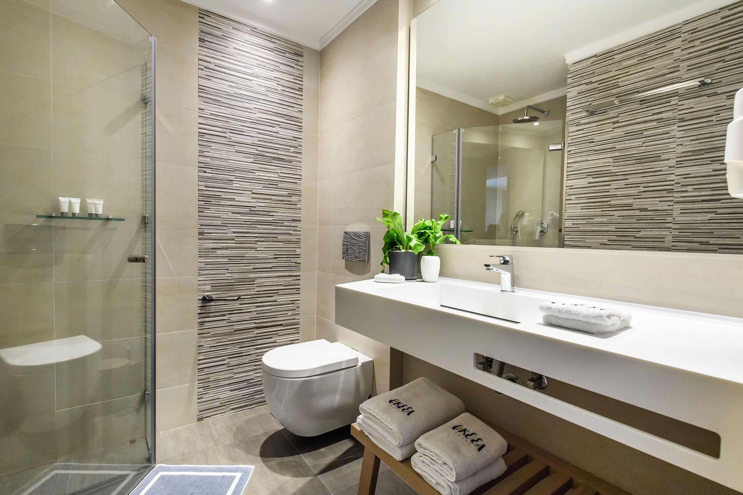 superior room | bathroom | shower, rainfall showerhead, free toiletries, hair dryer