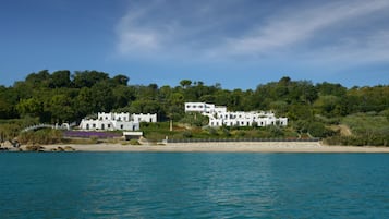 On the beach, sun loungers, beach umbrellas, beach bar