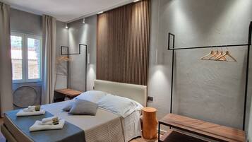Sábanas italianas Frette, cubrecamas y minibar