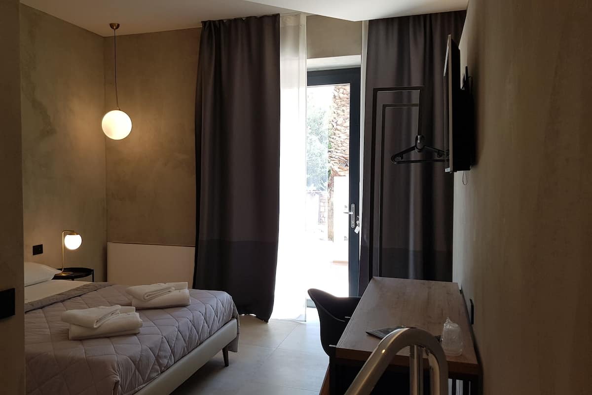 Design suite | Italiaanse Frette-lakens, donzen dekbedden, een minibar