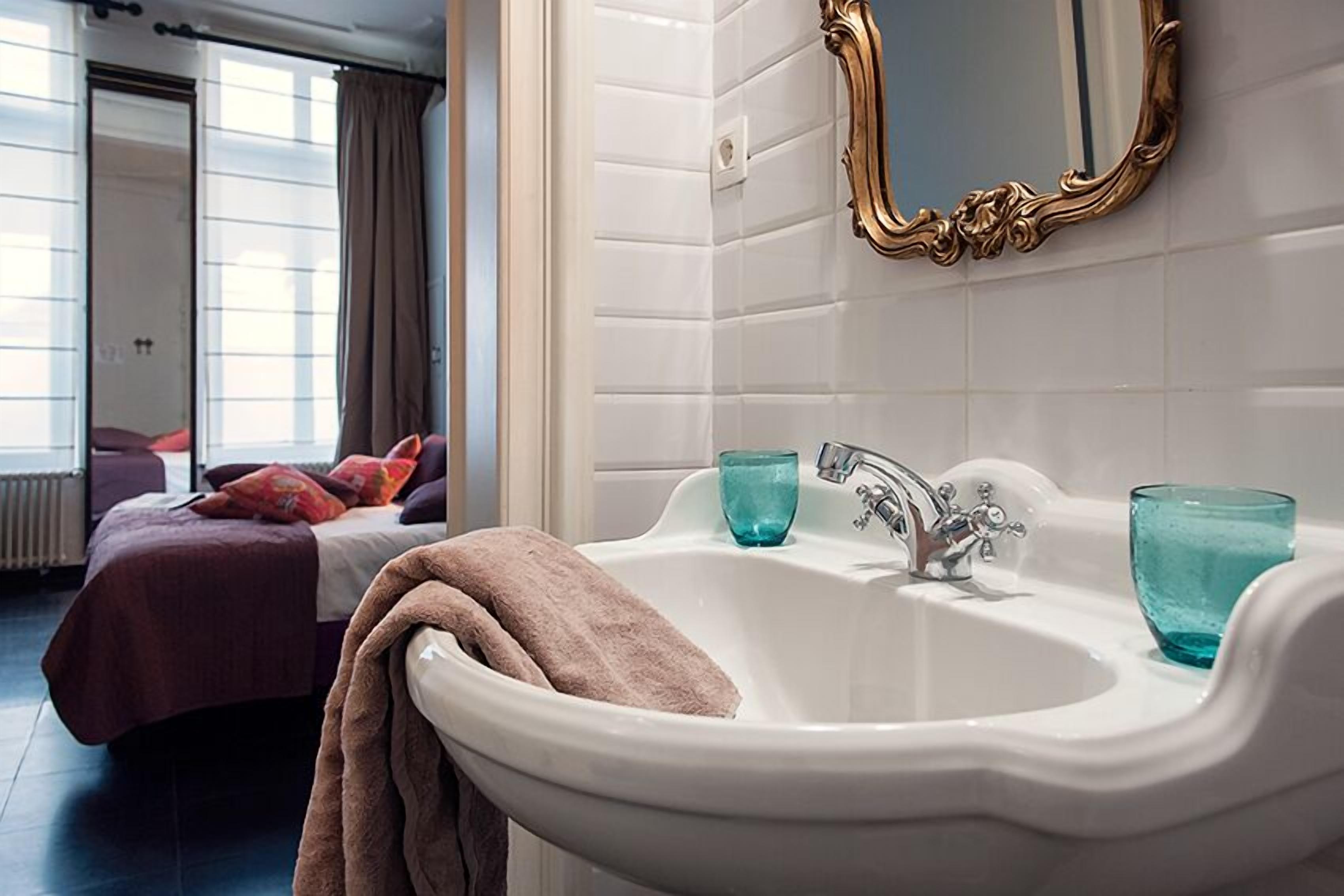 superior double room | bathroom | shower, designer toiletries, hair dryer, slippers