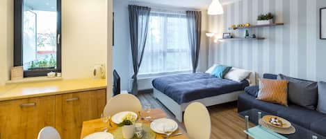 Deluxe Studio Suite (Sandomierska 3 Street) | Living area | Flat-screen TV