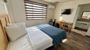 Habitación ejecutiva | Caja de seguridad en la habitación, wifi gratis y ropa de cama