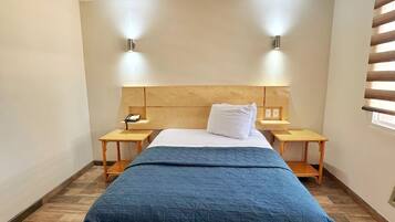 Habitación ejecutiva | Caja de seguridad en la habitación, wifi gratis y ropa de cama